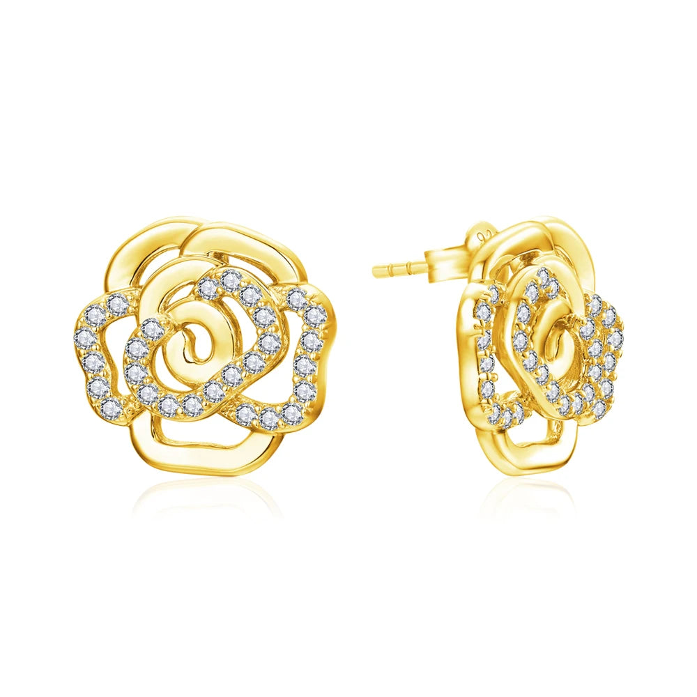 Gold rose-shaped earrings with diamond accents on a white background