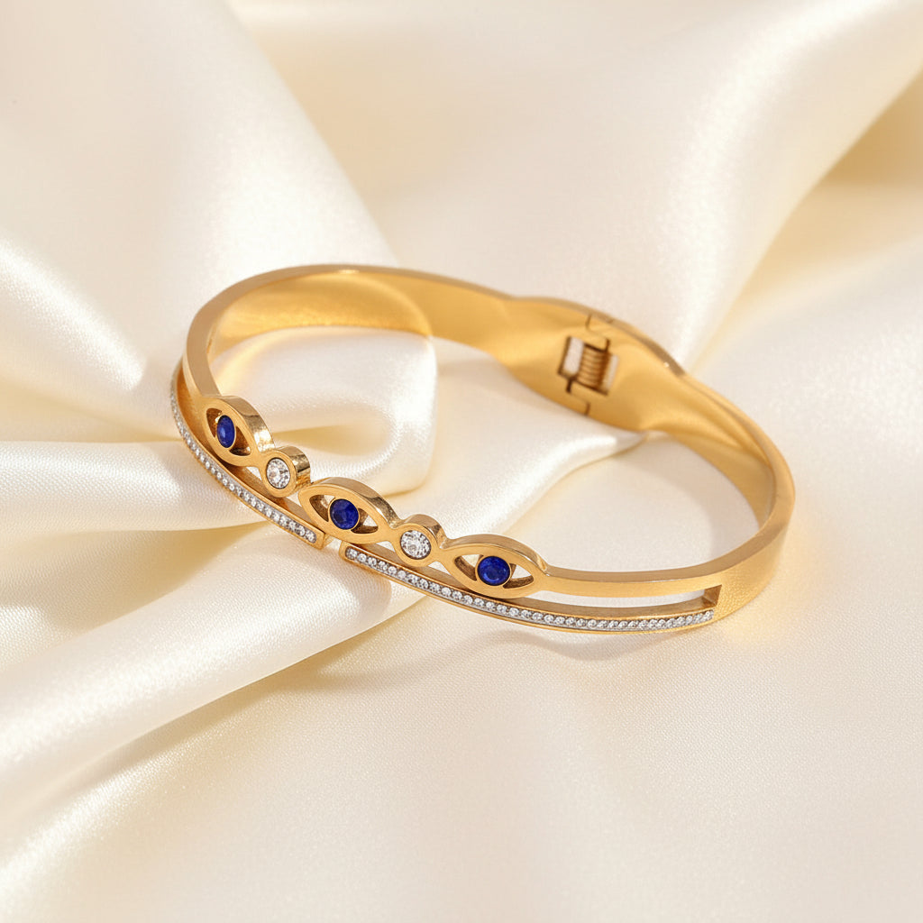 18K Gold Plated Bangle with Blue Eye Motifs and Zirconia Accents