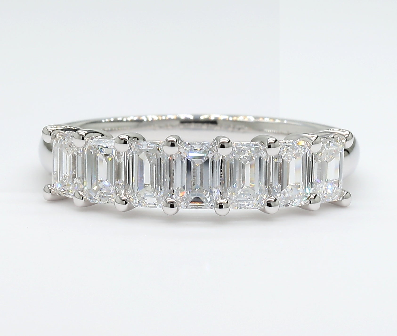 1.51 cttw 14k White Gold Emerald 7 Stone Wedding Band, Basket Setting